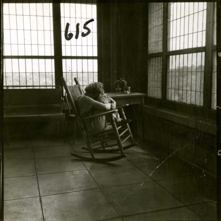 Patient on Rocking Chair. Photograph, 1955. Courtesy U.S. National Library of Medicine. 