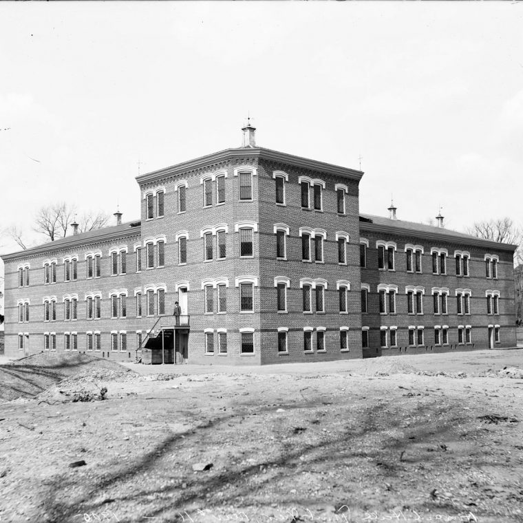 Howard Hall. Photograph, c. 1890s. The original structure of Howard Hall was completed in 1891. In addition to its primary function, Howard Hall was used for many years as a triage area for African American men coming into the hospital, whether or not they were convicts. Courtesy National Archives and Records Administration. 