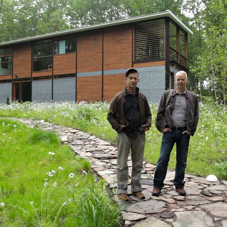 FlatPak House residents Rodney White and Thomas Brown, Callicoon, New York. Architect: Lazor Office. Built: 2008. Film Still: Ariel Efron; Local Projects. 