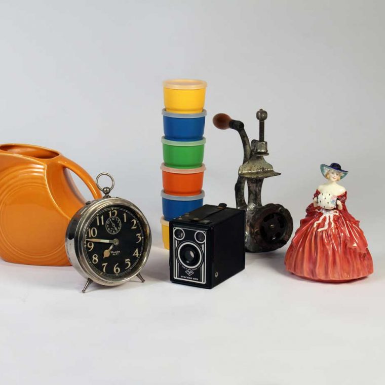 Fiestaware Pitcher, 1950s-60s; Big Ben alarm clock, 1920s; Tupperware snack cups, 1970s; Camera, 1940s (Howard County Historical Society, Ellicott City, Maryland); Meat grinder, 1940s; Royal Doulton figurine, 1962 (Private Collection). Photo by Museum staff. 