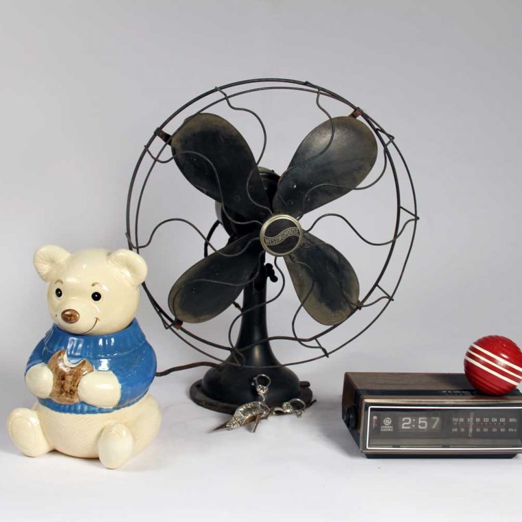 Cookie jar, 1980s (C. W. Rynd); Table fan, 1920; Candle snuffer & wick trimmer, early 19th century (Howard County Historical Society, Ellicott City, Maryland); Clock radio, 1980s; Croquet ball, 1980s (Montgomery County Historical Society, Maryland). Photo by Museum staff. 