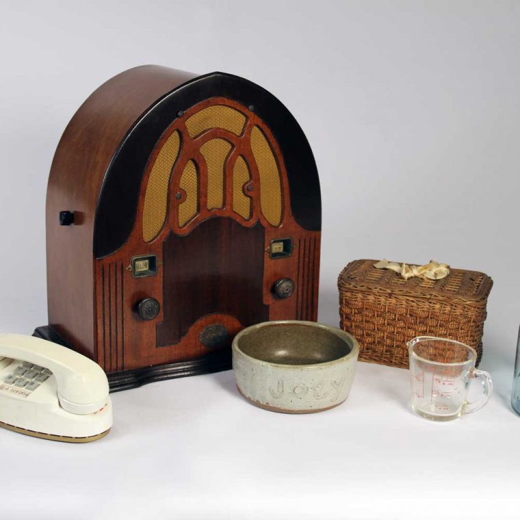 Princess telephone, 1959 (Marilyn and Michael Glosserman); Cathedral Radio, 1930s (National Capital Radio and Television Museum, Bowie, Maryland); Dog bowl for water, 1980s (Joanna Church); Sewing basket, mid 20th century (Howard County Historical Society, Ellicott City, Maryland); Pyrex liquid measuring cup, ca. 1950; Canning jar, 1940s (Curtis and Nancy Bateman). Photo by Museum staff. 