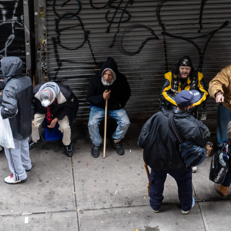 March 30, 2020: Socializing under the Myrtle Avenue Subway Station, 943 Broadway, Brooklyn, New York. © Camilo José Vergara 