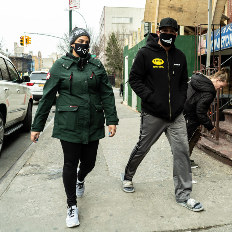 March 18, 2020: Couple wearing his and hers masks, Willis Avenue at 143rd Street, Bronx, New York. © Camilo José Vergara 