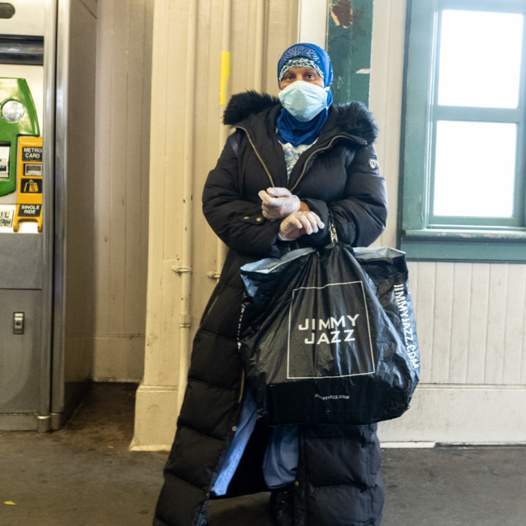 March 19, 2020: Healthcare worker waiting for the train, Simpson Avenue subway station, Bronx, New York. © Camilo José Vergara 