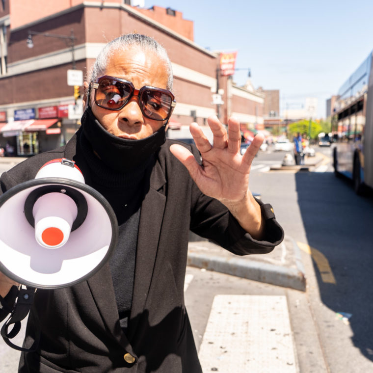 May 25, 2020: Born-again evangelist Maria preaching salvation through the Lord on East 149th Street and Third Avenue, Bronx, New York. © Camilo José Vergara 