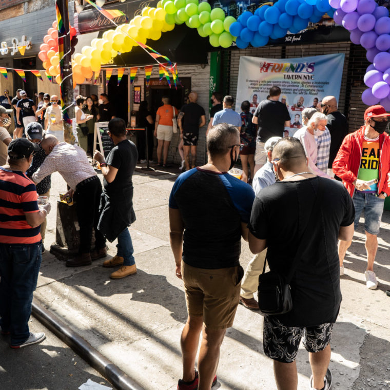 June 7, 2020: The banner on the facade of Friend’s Tavern is a memorial to the patrons of this LGBTQ night club who lost their lives to Covid-19, 7811 Roosevelt Avenue, Queens, New York. © Camilo José Vergara 