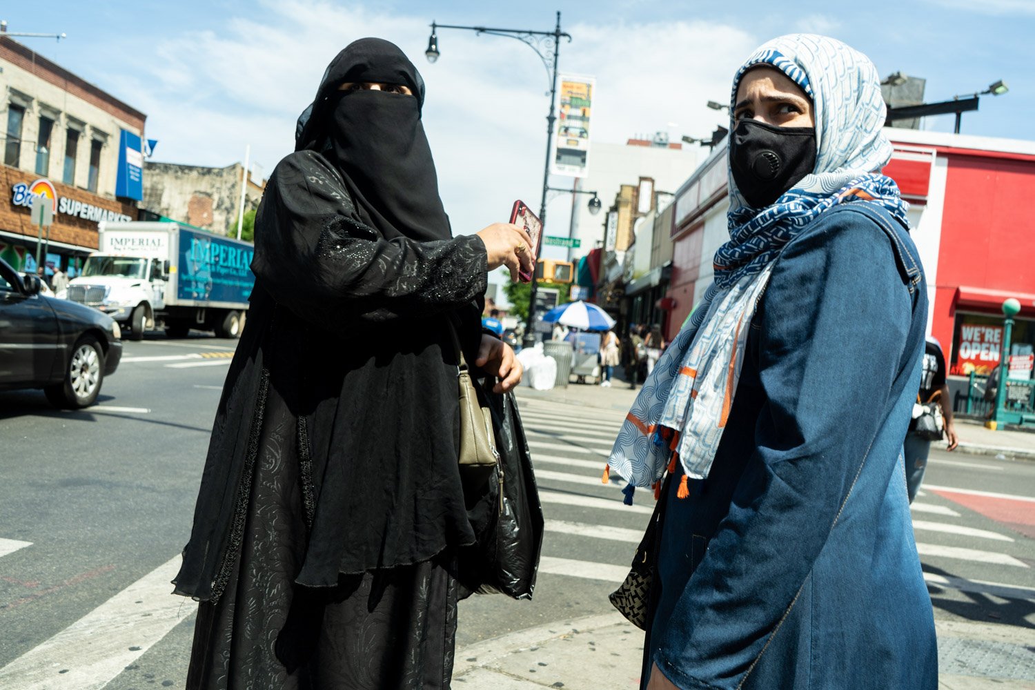 June 16, 2020: Two women on Fulton Street at Nostrand Avenue, Brooklyn, NY. © Camilo José Vergara