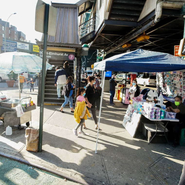 November 7, 2020: Street vendors at the entrance to the 7 Train. Elmhurst Avenue at 90th Street, Queens, New York. © Camilo José Vergara 