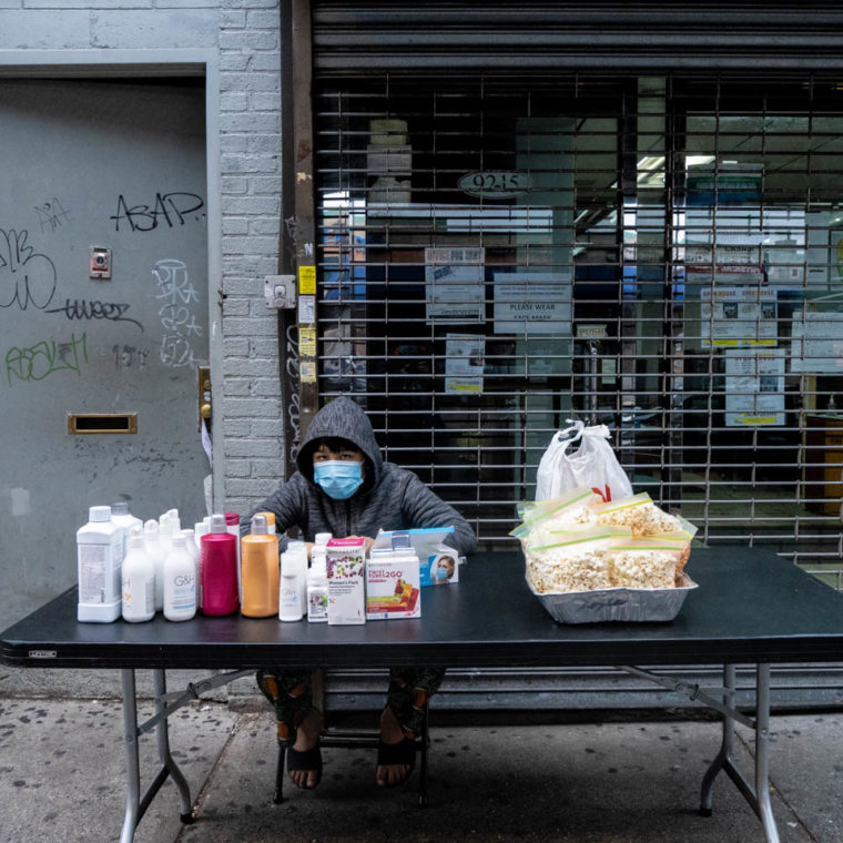 November 15, 2020: Child street vendor. 9215 Roosevelt Avenue, Queens, New York. © Camilo José Vergara 