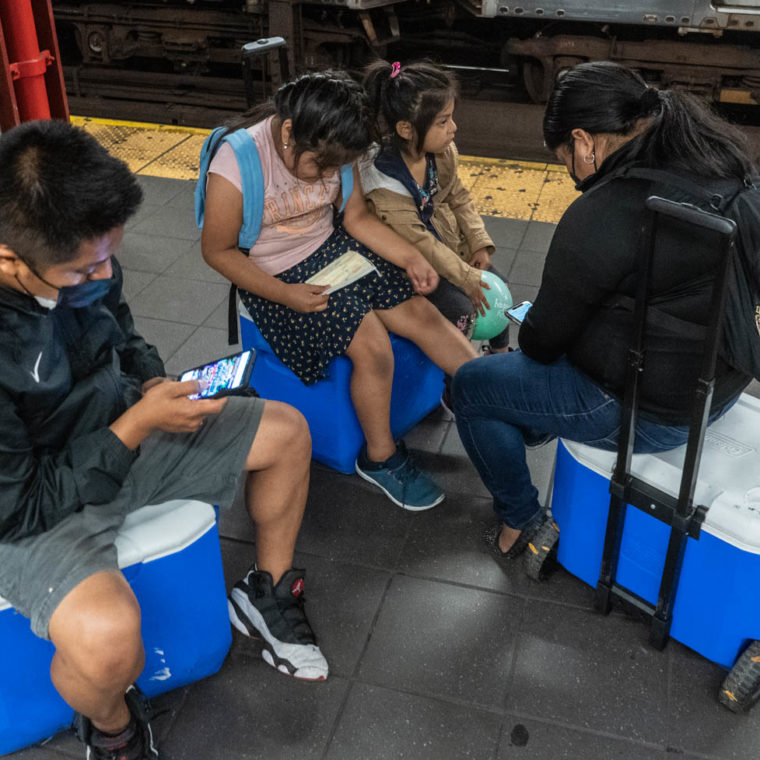 October 20, 2020: The end of the day for a food-vending family. 96th Street Station at Broadway, New York, New York. © Camilo José Vergara 